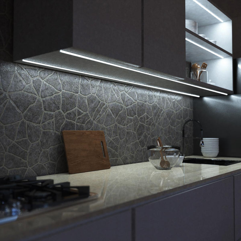 side close up of a kitchen with cool white strip lights