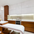 Side shot of a kitchen with an LED tape under the cabinets
