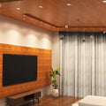 corner shot of a living room with mounted chrome tilted downlights
