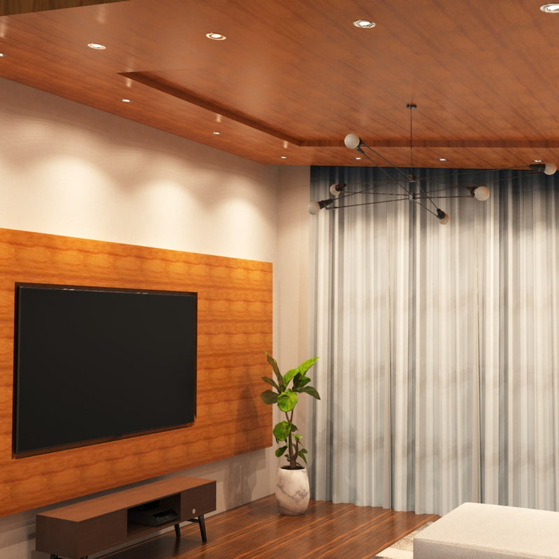 corner shot of a living room with mounted chrome tilted downlights