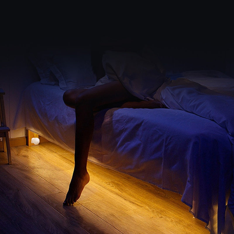 mounted LED lamp with PIR Sensor at the base of the bed