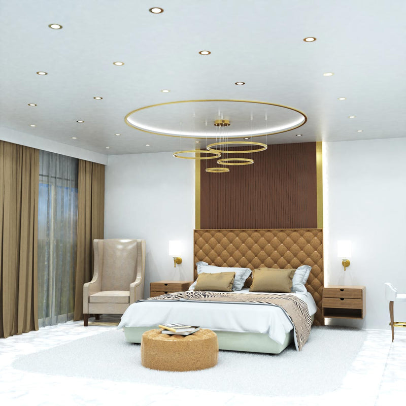 full shot of a bedroom that has mounted brass LED downlights with cool white light