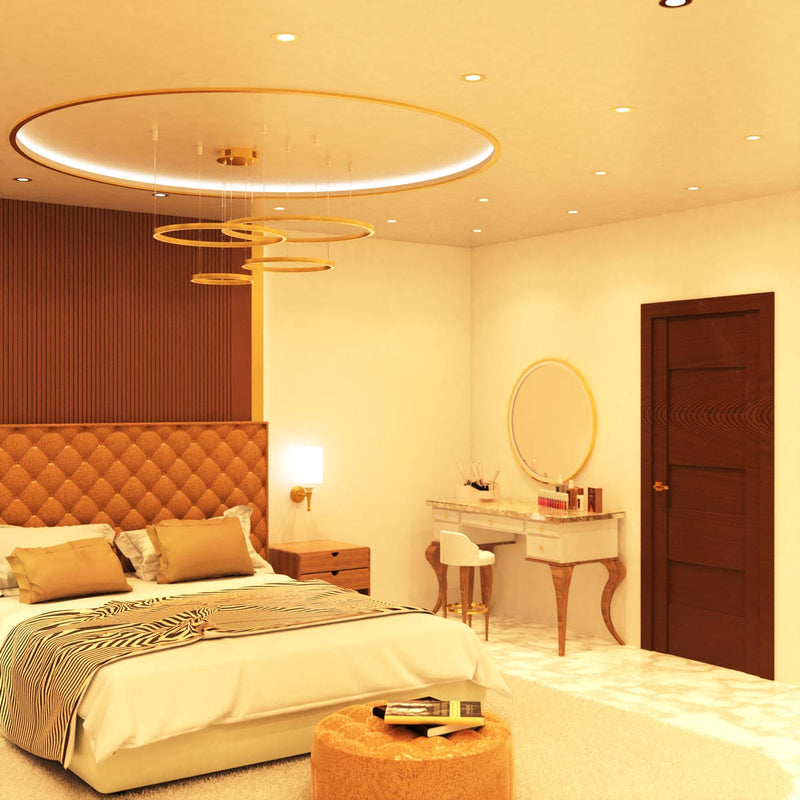 full shot of a bedroom that has mounted brass LED downlights with warm white light