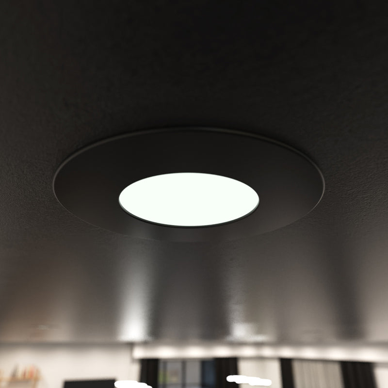 close up of a mounted matt black CCT fire-rated downlight in natural white 