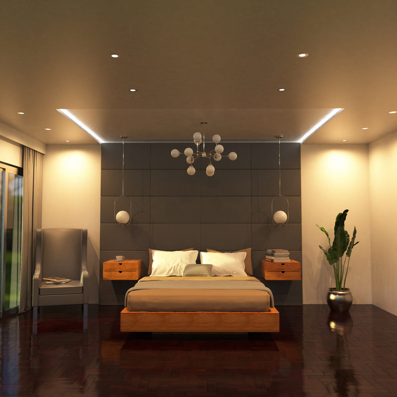 full shot of a bedroom with brushed chrome LED downlights with warm white light