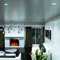 side of a living room with mounted brushed chrome downlights