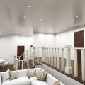 living room with mounted white fire-rated downlights