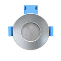 top of a brushed chrome LED fire-rated downlight
