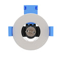 front of a white fixed fire-rated LED downlight