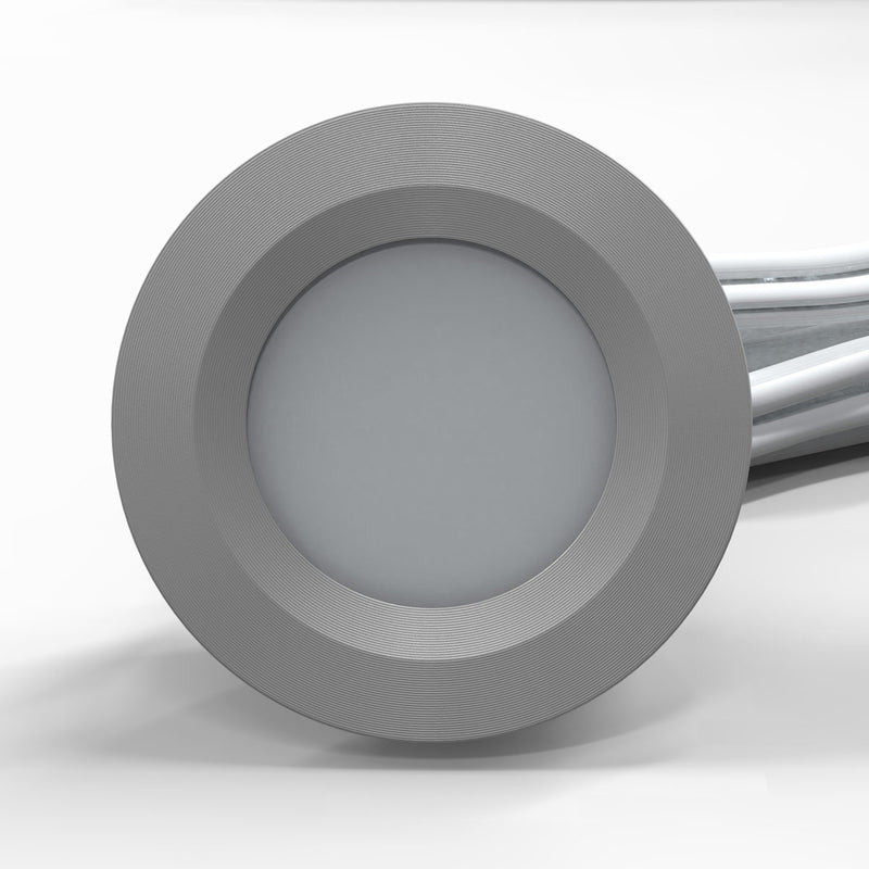 Front of a round LED plinth light