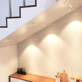 mid shot of a corner with mounted chrome fire-rated downlights