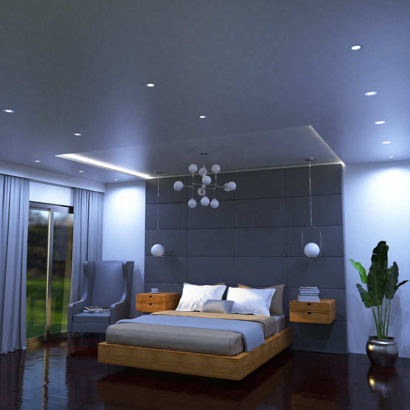 full shot of a bedroom with mounted cool white brushed chrome downlights