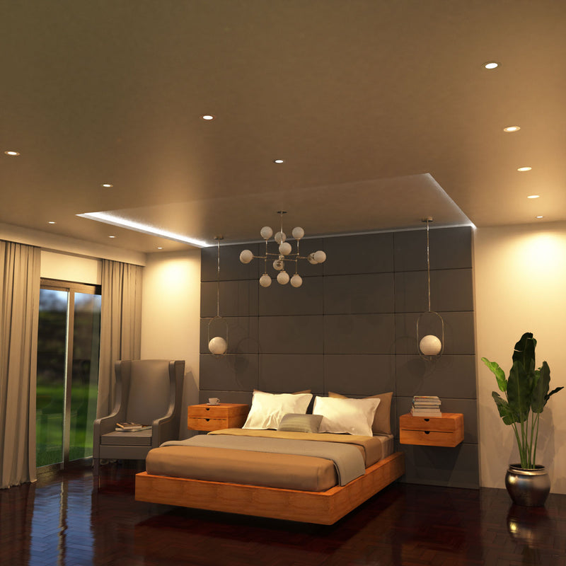 full shot of a bedroom with mounted warm white brushed chrome downlights