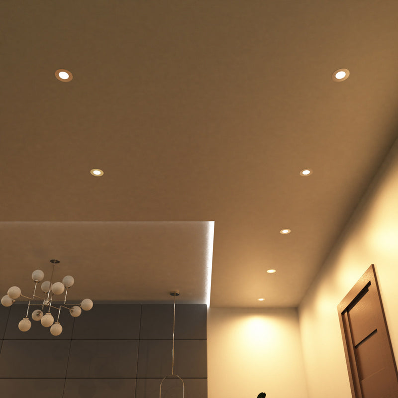 full shot of a ceiling with mounted warm white brushed chrome downlights