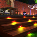 Decking steps with orange deck lights
