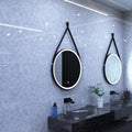 matte black LED bathroom mirror in cool white light mounted above the sinks