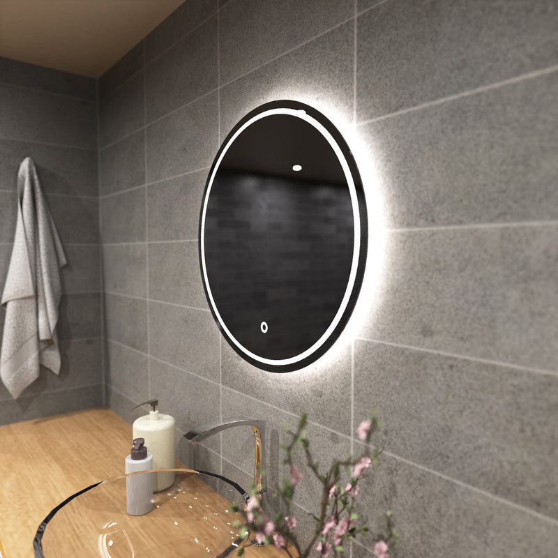 vanity with a round LED bathroom mirror in natural white light