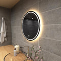 vanity with a round LED bathroom mirror in warm white light