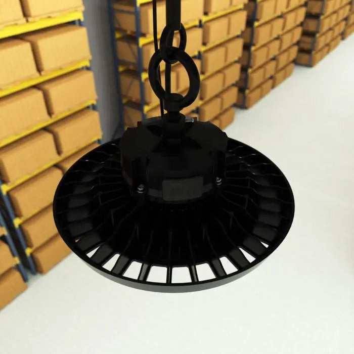top view of the 200W LED high bay light inside a warehouse boxes on shelf are visible 