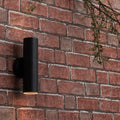 Close-up of Black Outdoor Up/Down Wall Light on a brick wall