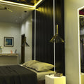 side shot of a bedroom with mounted plaster-in LED profiles