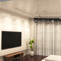 living room corner with white downlights in natural white lights