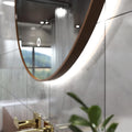 LED Bathroom mirror - Walnut in natural white light backlit close up