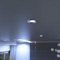 medium close up shot of a mounted cool white brushed chrome downlight
