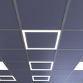mid close-up of a ceiling with edge-lit LED panels in cool white light