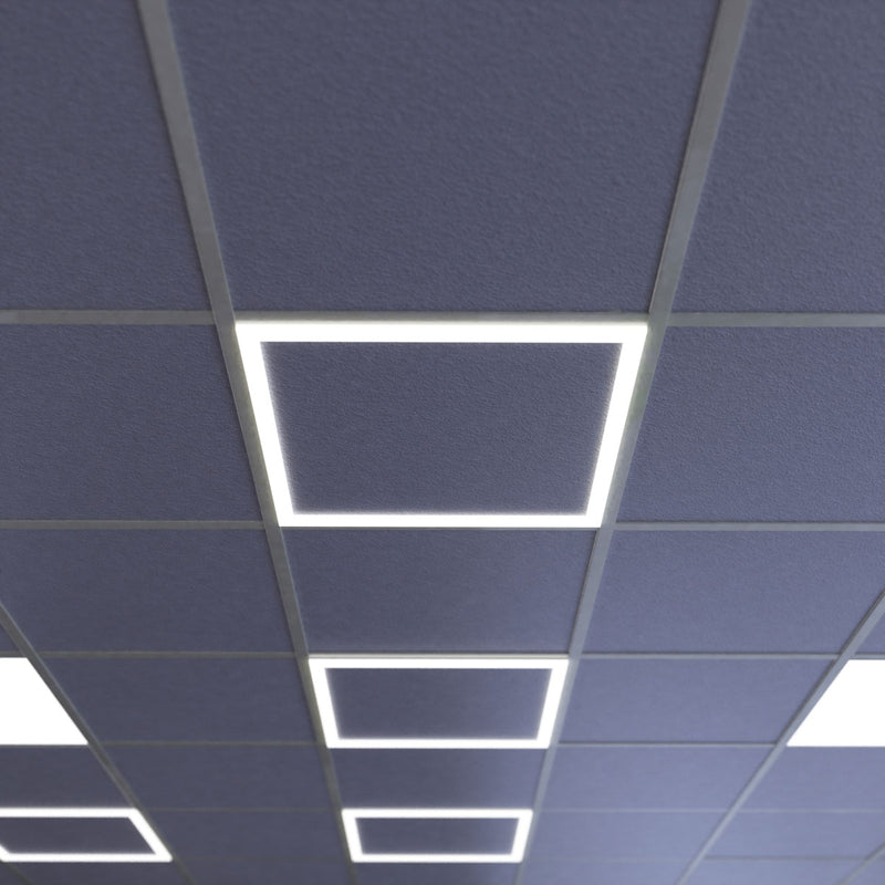 mid close-up of a ceiling with edge-lit LED panels in cool white light
