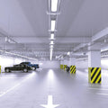 parking lot that has hanging LED battens with cool white light