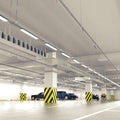 parking that has hanging LED battens with natural white light