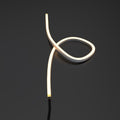 side bending warm white neon flex looped close up