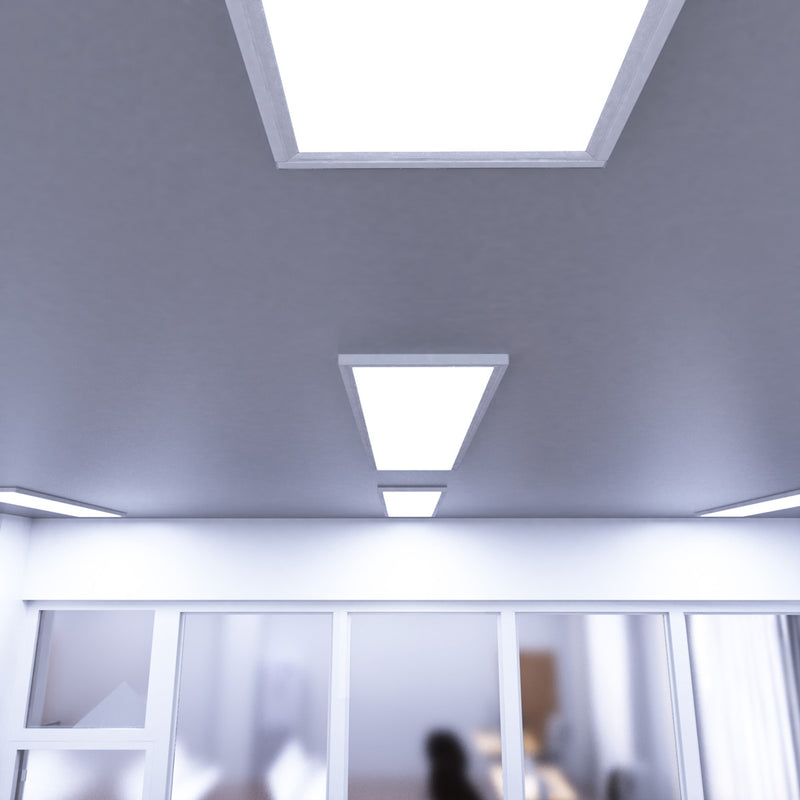 mid shot of a conference room that has mounted LED panel lights with cool white light