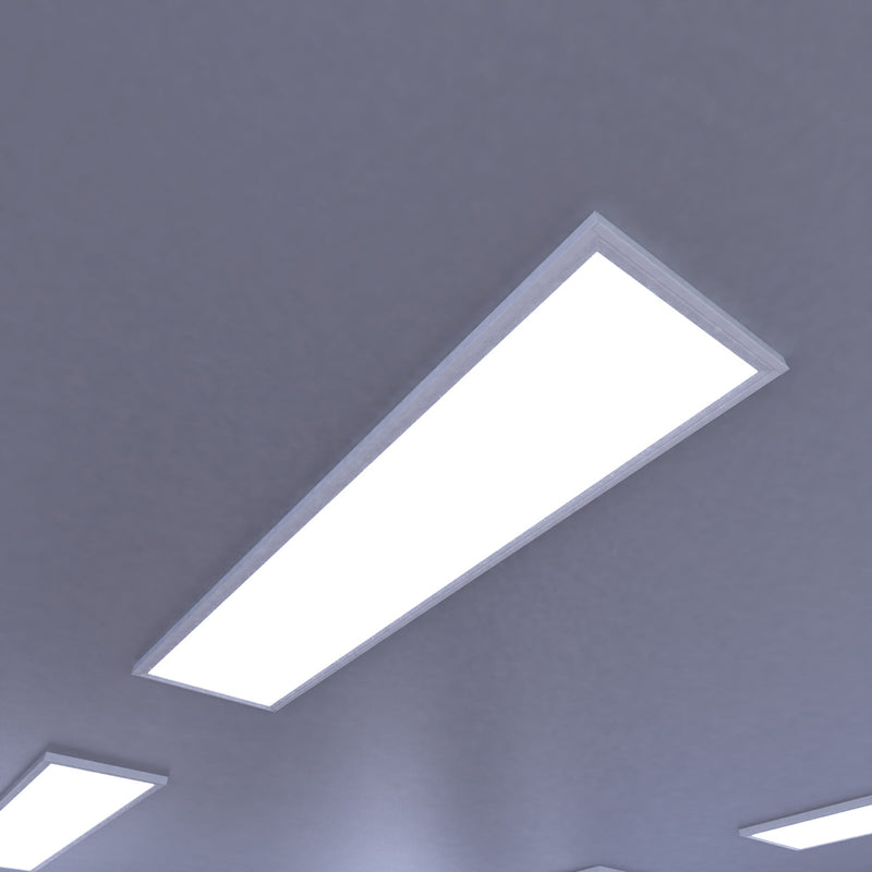 close up of a ceiling with surface-mounted LED panels with cool white light