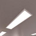 close up of a ceiling with surface-mounted LED panels with natural white light