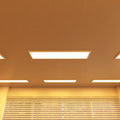 ceiling with surface-mounted LED panels with warm white light