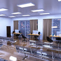 workspace that has mounted 1200mm x 600mm  panel lights with cool white light