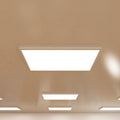 close up of a ceiling that has surface-mounted LED panels with natural white light