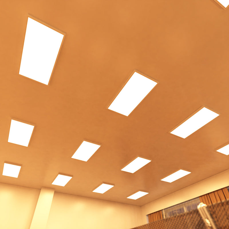 ceiling of a workspace that has surface-mounted LED panels with warm white light