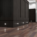 Sideview of LED plinth lights with natural white light on a kitchen island