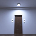full shot of a mounted LED bulkhead light with cool white light