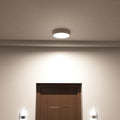 mid close up of a mounted LED bulkhead light with natural white light