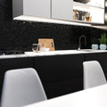 mid shot of a kitchen that has a black LED profile with a frosted cover