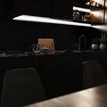 mid shot of a kitchen with mounted black corner profile
