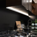 close up of a kitchen with mounted black corner profile