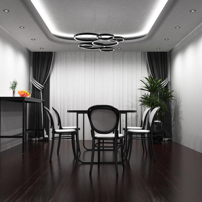 full shot of a dining room with mounted black fire-rated LED downlights