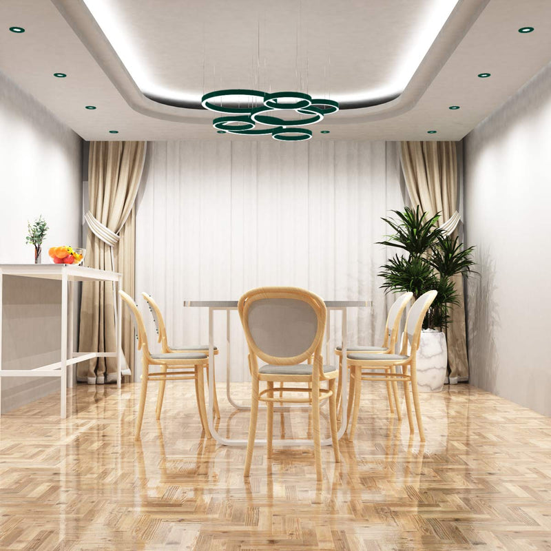 full shot of a dining room with mounted green fire-rated LED downlights