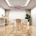 full shot of a dining room with mounted pink fire rated LED downlights