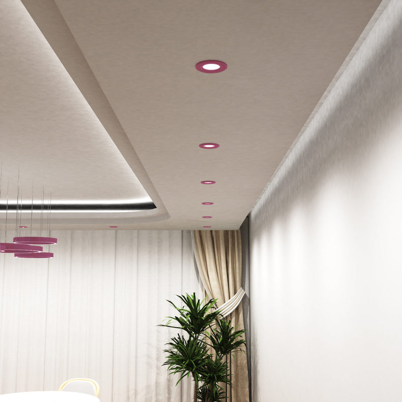 mid shot of a dining room with mounted pink fire rated LED downlights